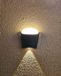 Modern Wall Sconce on Textured Surface