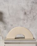 bonhomie_beige_semi-circle_shaped_ceramic_bookend.jpg