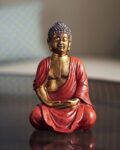 pure_home_and_living_red_lord_buddha_polyresin_sculpture.jpg